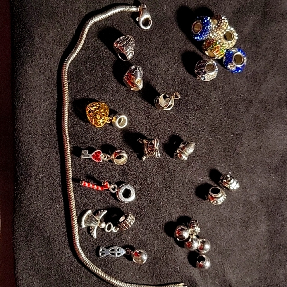 22 Individuality Beads - 925 SS Charms and 8.5" SS bracelet from Kohl's
